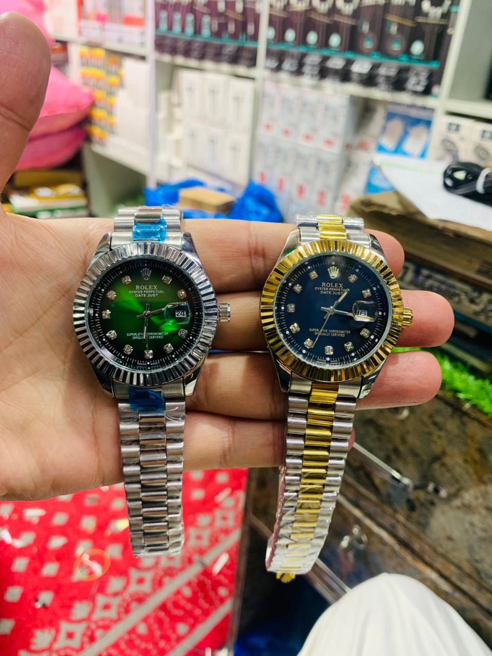 Luxury Rolex Timepieces: The Epitome of Horological Excellence and Iconic Design ( silver with green dial ) ( golden with black dial )